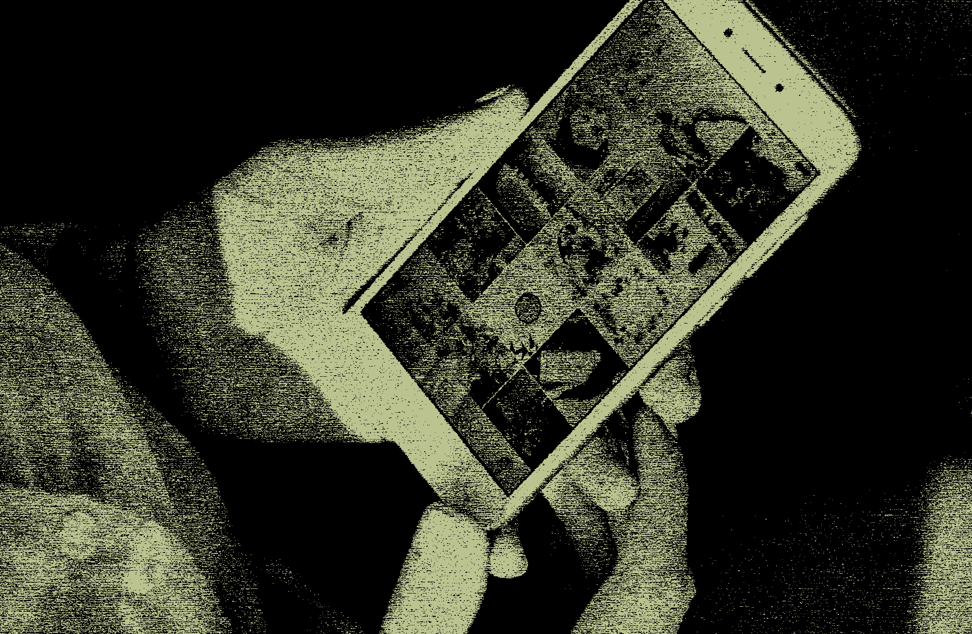 Ein Bild von einer Person die ein Smartphone benutzt